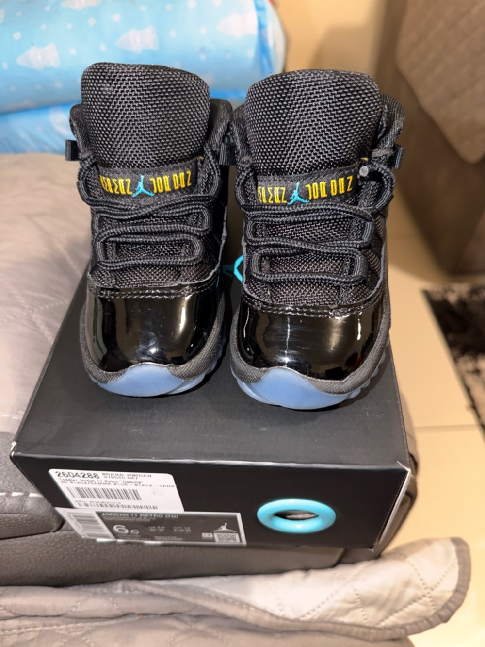 JORDAN 11 RETRO BLACK/GAMMA BLUE-BLACK